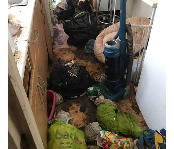 Photo of how tenant left property after they moved out. 